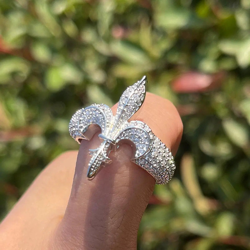 The Fleur De Lys Iced Out Ring - Cartice™LuxuryJewelryGoldSilverWatchBraceletNecklaceChainIced-outCubanMoissaniteTarnish-freeStainlessDurablePremiumShinePlatedStatementDiamondAffordable